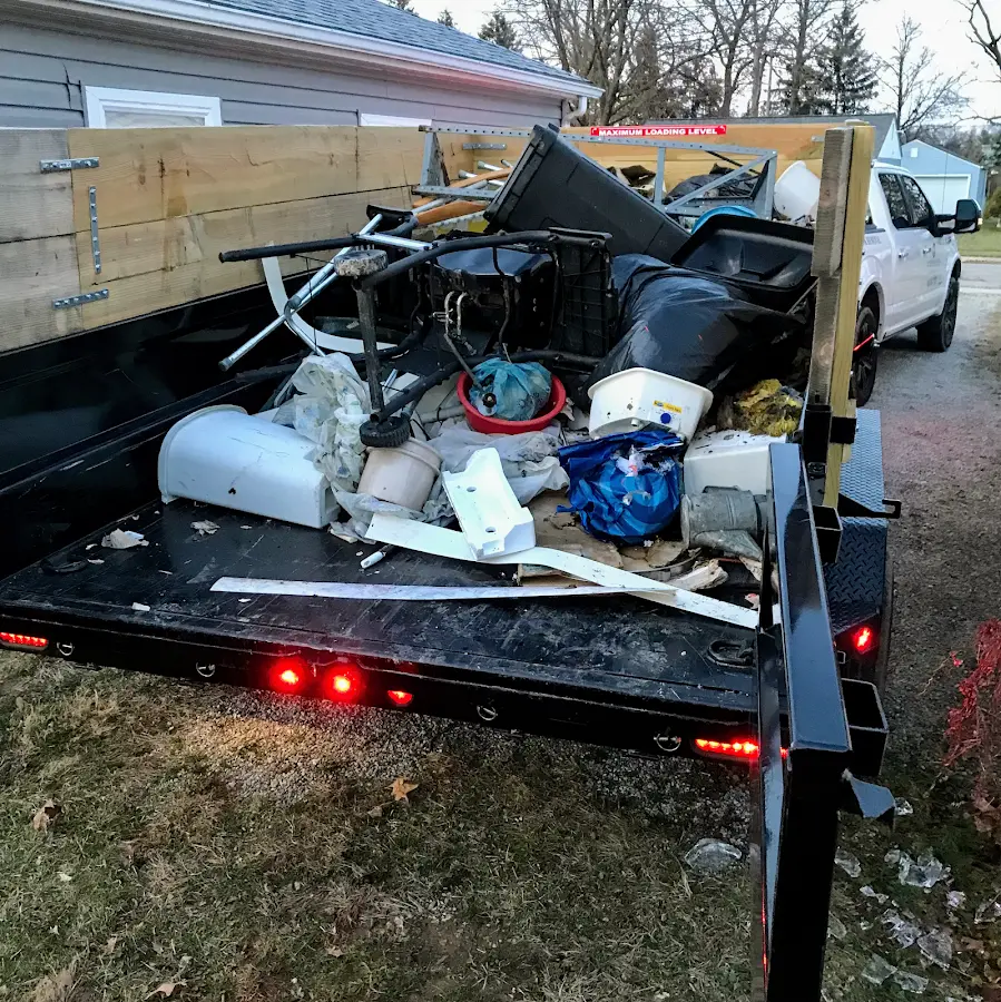 Roll-off dumpster delivered to a residential driveway in Elyria
