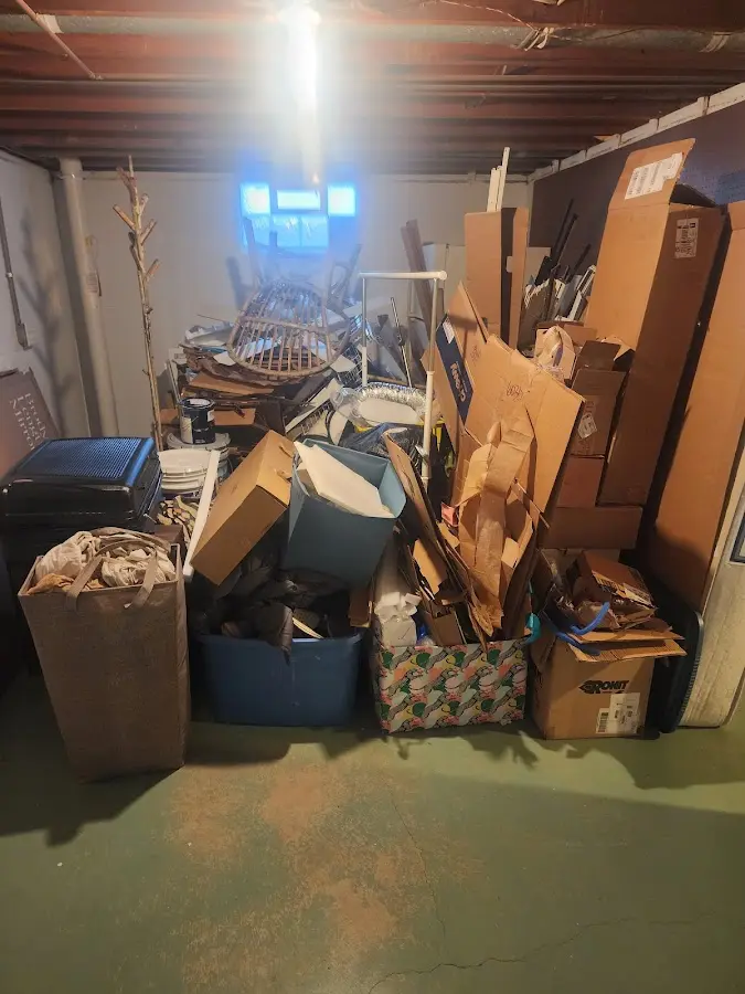 Roll-off dumpster container at job site for Yard Waste Dumpster Rental in Elyria